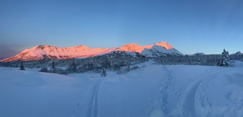 Beautiful alpenglow in Chugach State Park Snowshoeing Adventure